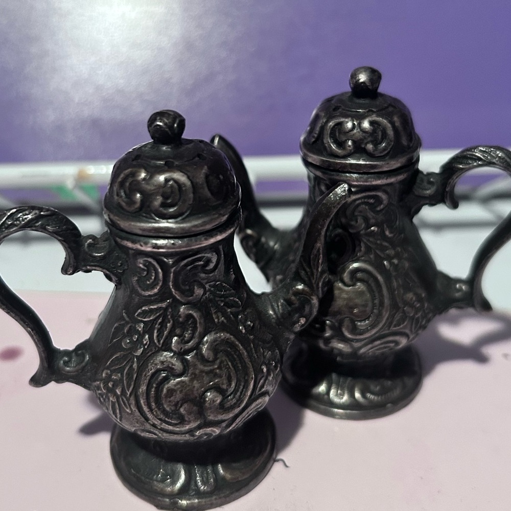 Intricately Designed silver plate salt and pepper shakers as victorian teapots-